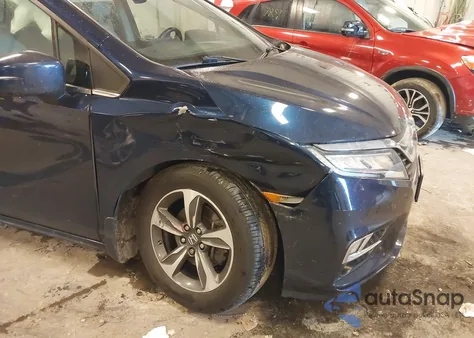 2019 Honda Odyssey Touring z USA, uszkodzony, nr VIN 5FNRL6H82KB027149